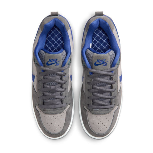 Gray and blue Nike SB sneakers on a white background
