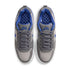 Gray and blue Nike SB sneakers on a white background