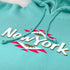 dollar can pullover hoodie mint closeup