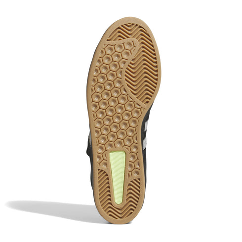 Close-up of a shoe sole with a textured pattern on a white background